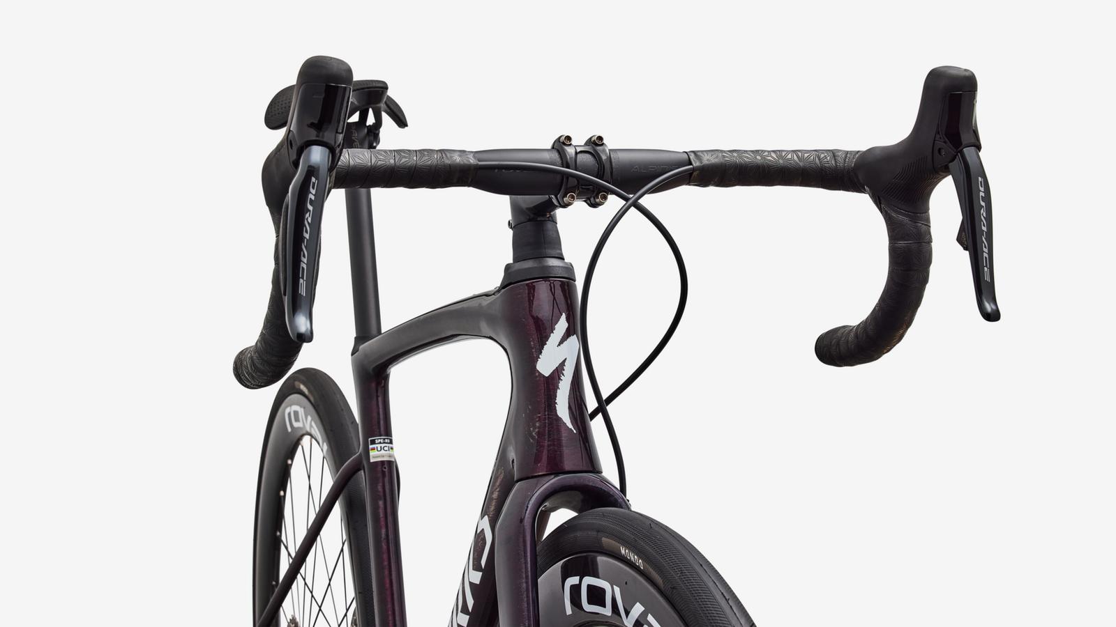 Specialized S-Works Roubaix SL8 - Gloss Carbon / Multi-color Directional Brush / White - Head Tube Detail